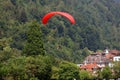 INTERLAKEN, AUGUST 02, 2022 - Tourists paragliding in Interlaken, Bernese Oberland, Switzerland