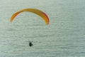 Paragliding in the sky over the sea. The concept of parachute flight. Tandem skydiver pilot and passenger fly on a sunny day Royalty Free Stock Photo