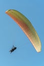 Paragliding in the sky over the sea. The concept of parachute flight. Tandem skydiver pilot and passenger fly on a sunny day Royalty Free Stock Photo