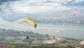 Paragliding in the sky. Paraglider  flying over Landscape from Beautiful View Mekong River Royalty Free Stock Photo