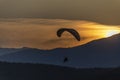 Paragliding at sunset with amazing view Royalty Free Stock Photo