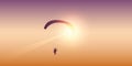 Paragliding at sunset in the sky