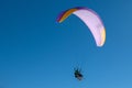 Paragliding tandem flights above ski resort.