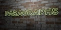 PARAGRAPHS - Glowing Neon Sign on stonework wall - 3D rendered royalty free stock illustration