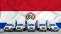 Paraguai flag in the background. Five new white trucks are parked in the parking lot. Truck, transport, freight transport. Freight