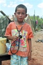 Portrait of poor Paraguayan boy with a dream