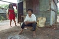 Couple living in poverty in Paraguayan slum