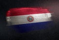 Paraguay Flag Made of Metallic Brush Paint on Grunge Dark Wall