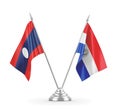 Paraguay and Laos table flags isolated on white 3D rendering.