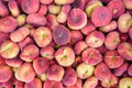 Paraguayan sweet peaches stacked in a container box to the raw for sale, overhead photo Royalty Free Stock Photo