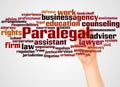 Paralegal word cloud and hand with marker concept Royalty Free Stock Photo