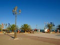 Paralia Katerinis, Greece - Tourists relaxing on the promenade by the sea Royalty Free Stock Photo