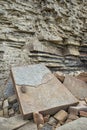 Parallel layers of sedimentary rocks consisting of sandstone slabs Royalty Free Stock Photo