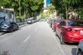 Parallel parking cars on urban street. Outdoor parking on road