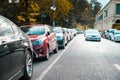 Parallel parking cars on urban street. Outdoor parking on road