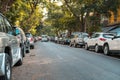 Parallel parking cars on urban street. Outdoor parking on road