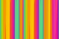 Parallel pattern bright stripes vertical yellow, orange, pink and mint art design basis background