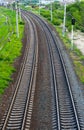 Parallel railway tracks recede into the distance Royalty Free Stock Photo