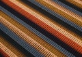 Parallel rows of different colored crops create a striped pattern Royalty Free Stock Photo