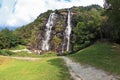 Parallel streams of water on a green hillside Royalty Free Stock Photo