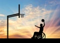 Paralympic disabled person in wheelchair playing basketball