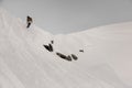 Paralympic snowboarder jumping down the white snow covered hill Royalty Free Stock Photo