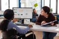 Paralyzed african american businesswoman in wheelchair Royalty Free Stock Photo