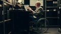 Paralyzed investigator does background check on potential culprit,