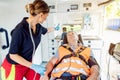 Paramedic in ambulance car giving driver the sign to drive off Royalty Free Stock Photo