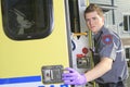 Paramedic employee with ambulance Royalty Free Stock Photo