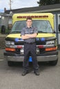 Paramedic employee with ambulance Royalty Free Stock Photo