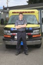 Paramedic employee with ambulance