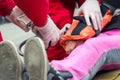 Paramedic helping a injured girl