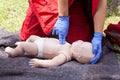 Paramedic performing infant CPR Royalty Free Stock Photo
