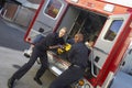 Paramedic preparing to unload patient Royalty Free Stock Photo