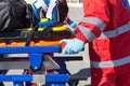 Paramedic rushing patient into ambulance Royalty Free Stock Photo