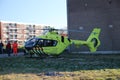 Paramedic trauma helicopter PH-ELP or Lifeliner 2 leaving scene of incident in Waddinxveen the Netherlands.