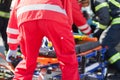 Paramedics and firefighters in urgent rescue operation after road traffic accident Royalty Free Stock Photo