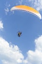 Paramotor on blue sky