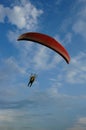 Paramotor Extreme Sports flying on blue sky