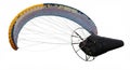 Paramotor featuring a large, multicolored paraglider wing with shades of yellow, blue, Royalty Free Stock Photo