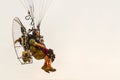 Paramotor flying on sky