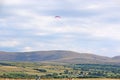 Paramotor pilot coming in to land at Llanbedr, Wales Royalty Free Stock Photo