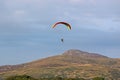 Paramotor pilot flying in the hills of Wales Royalty Free Stock Photo