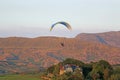 Paramotor pilot landing in the hills of Wales Royalty Free Stock Photo