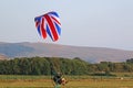 Paramotor pilot landing in the hills of Wales
