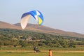 Paramotor pilot taking off in the hills of Wales Royalty Free Stock Photo