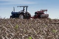 Ford tractor make direct soybean planting in a freshly harvested corn field in the state of