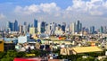 Paranaque, Metro Manila, Philippines - Baclaran Church with Makati Skyline in background