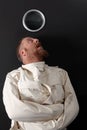 Paranoid man in a straitjacket Royalty Free Stock Photo